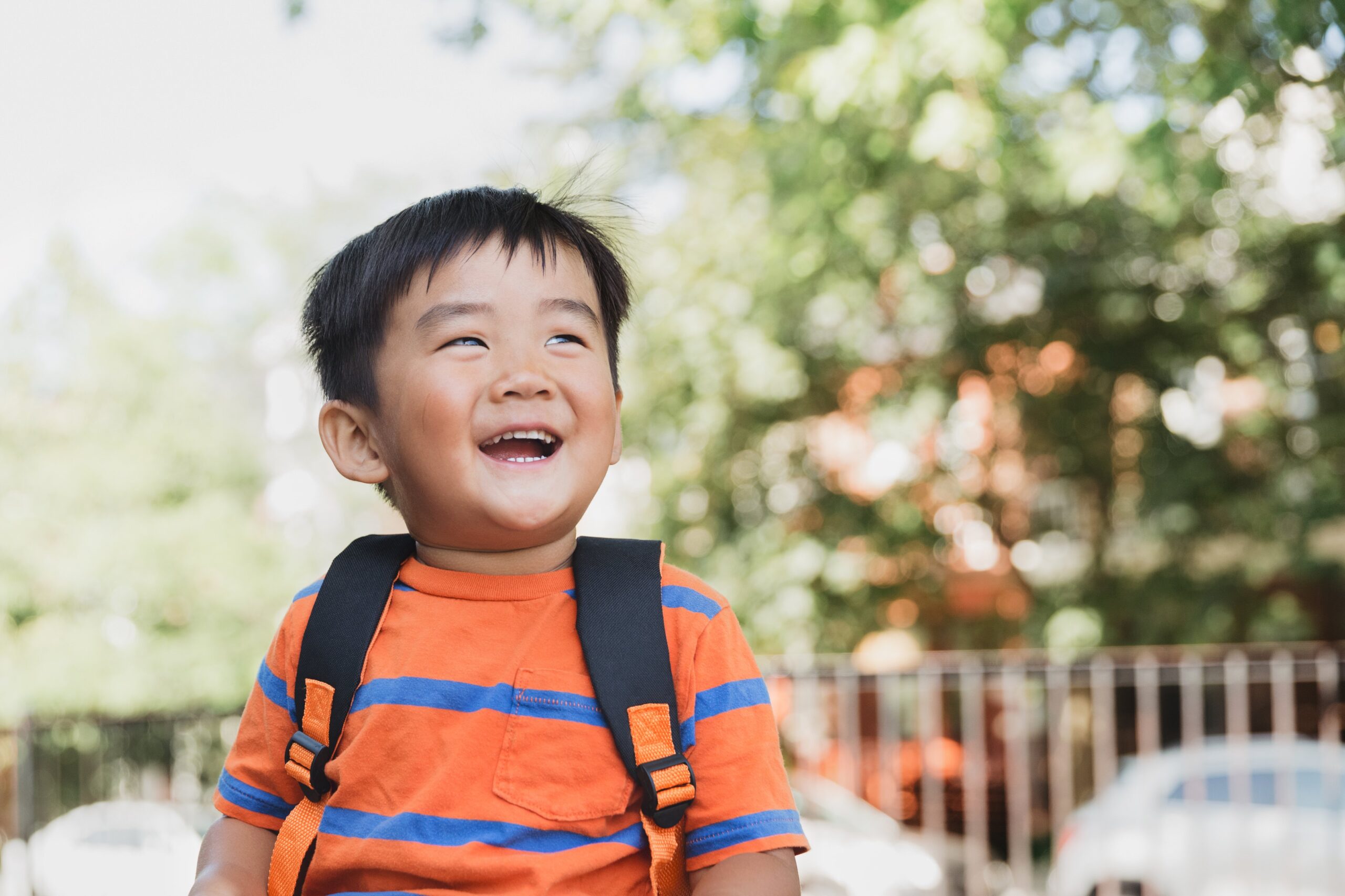school-child-giggles-in-the-sun